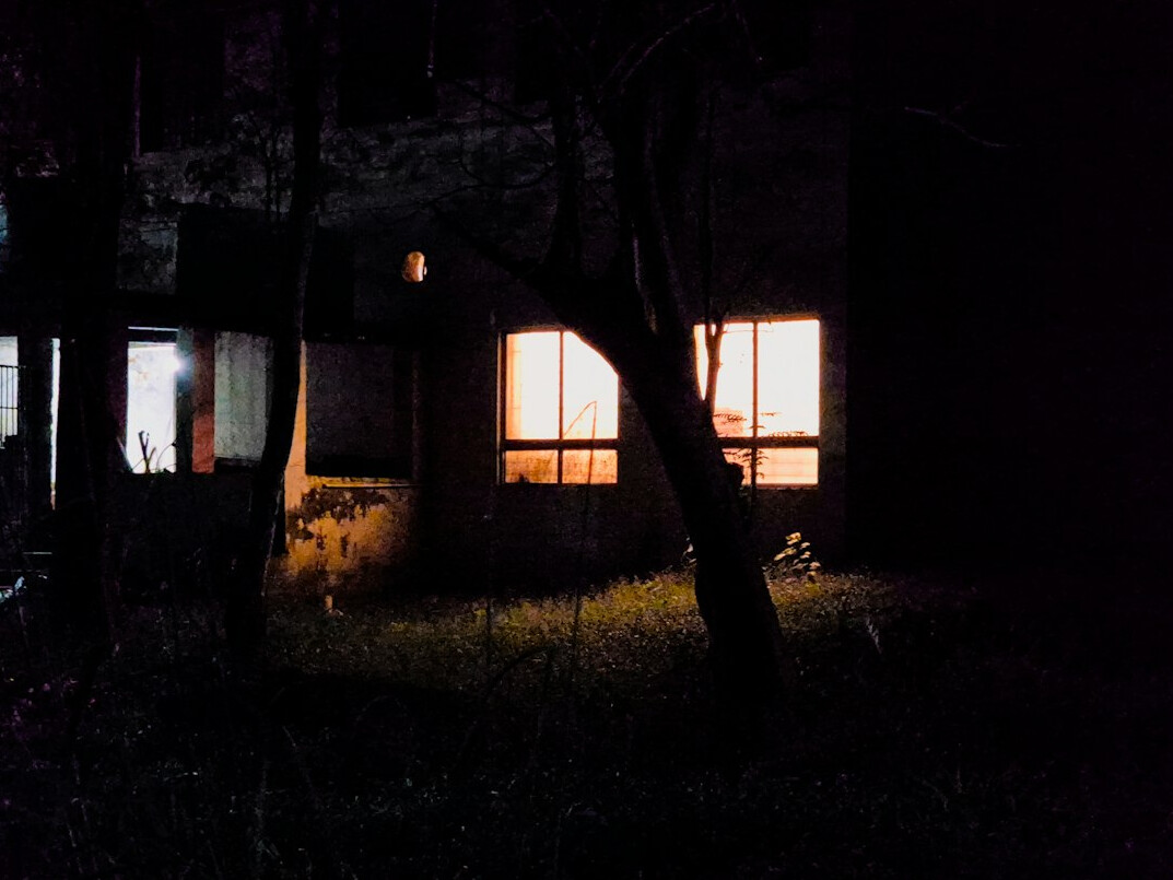 foggy abandoned house at dusk